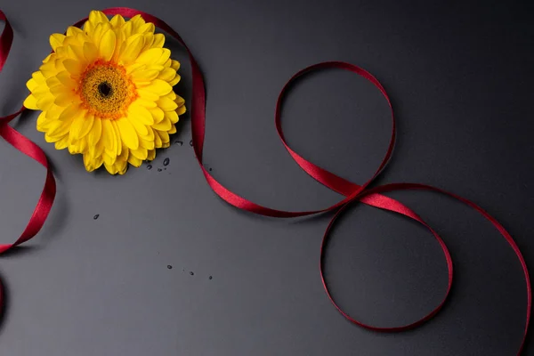 Yellow Flower Black Background Ribbon Form Number — Stock Photo, Image