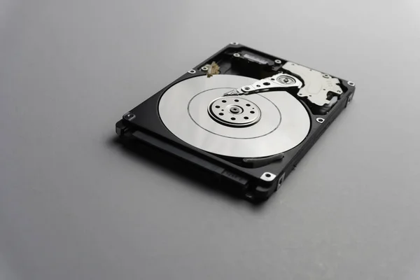 Close up of hard disk's internal mechanism hardware. Soft focus — Stock Photo, Image