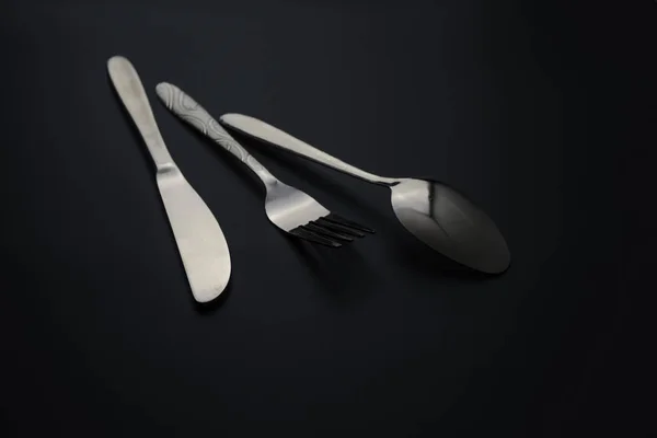 Fork and spoon on dark background, Restaurant concept. — Stock Photo, Image