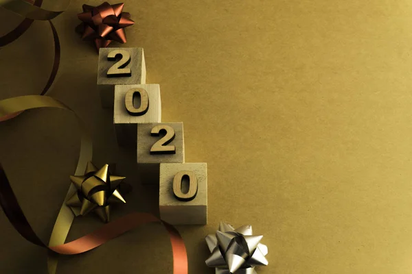 Mutlu yıllar 2020. Kahverengi arkaplanda 2020 numaralı sembol
