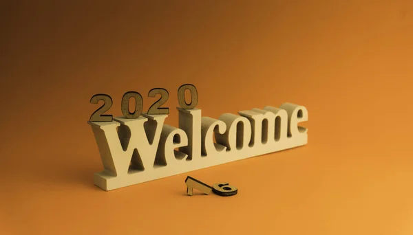 Gott nytt år 2020. Symbol från nummer 2020 på brun bakgrund — Stockfoto