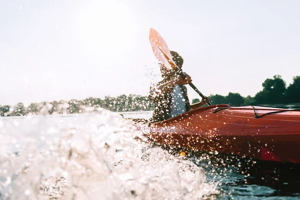 Young man kayaking — Stock Photo, Image