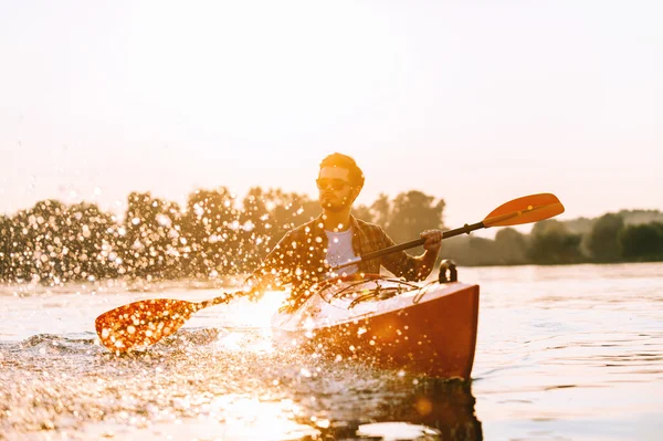 Young man kayaking — Stock Photo, Image