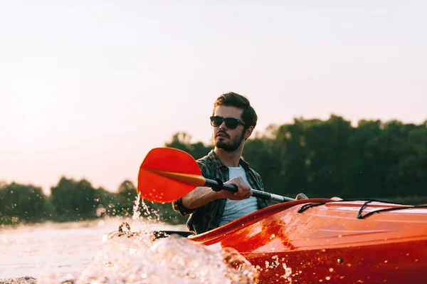 Young man kayaking — Stock Photo, Image