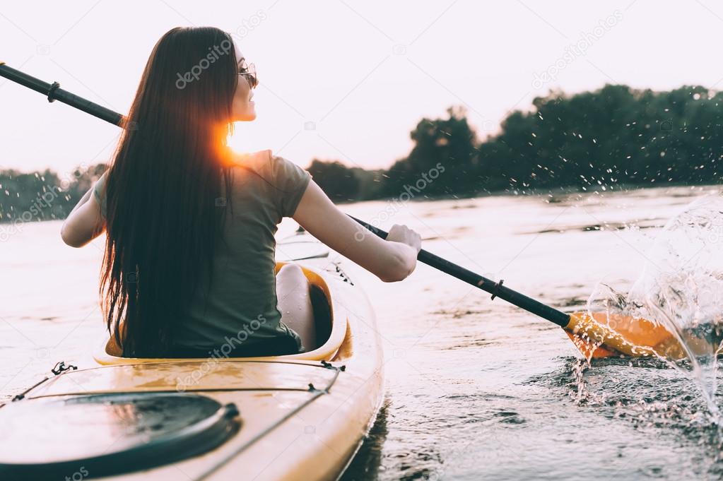 beautiful woman kayaking 