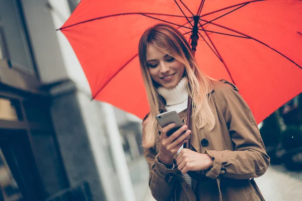 Beautiful young woman with umbrella — Stock Photo, Image