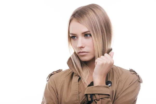 Beautiful young woman in autumn raincoat — Stock Photo, Image