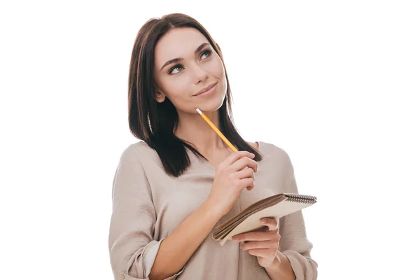 Frau schreibt Notizen — Stockfoto