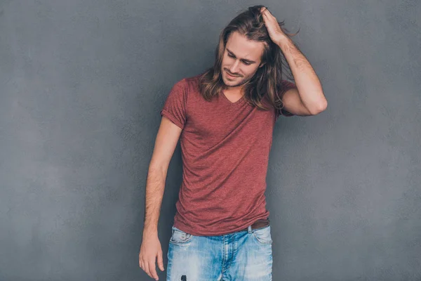 Man with long hair in casual wear — Stock Photo, Image