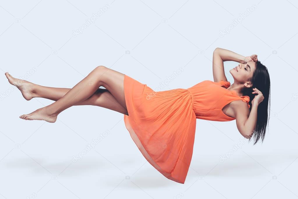 beautiful woman hovering in air
