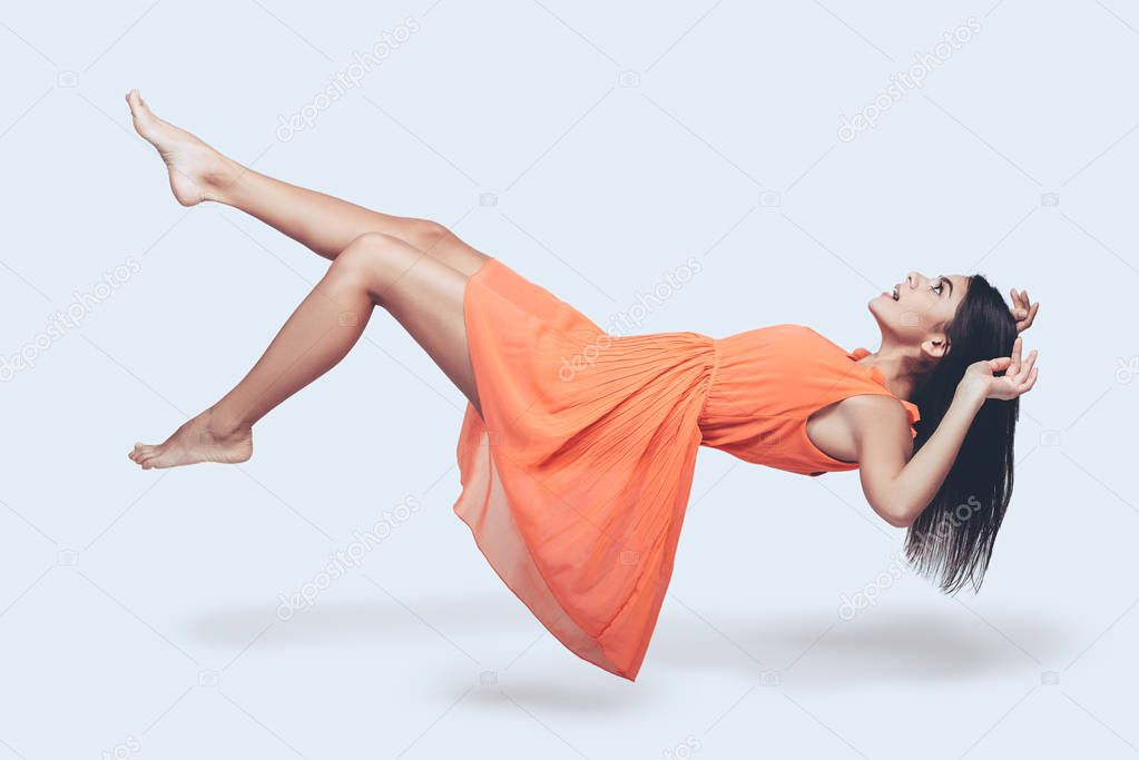 beautiful woman hovering in air