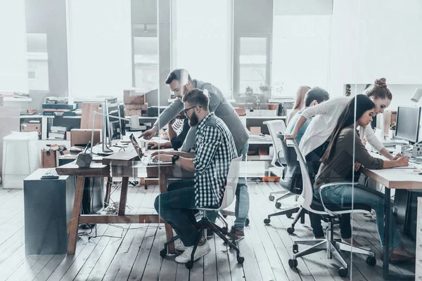 Young business people at office — Stock Photo, Image