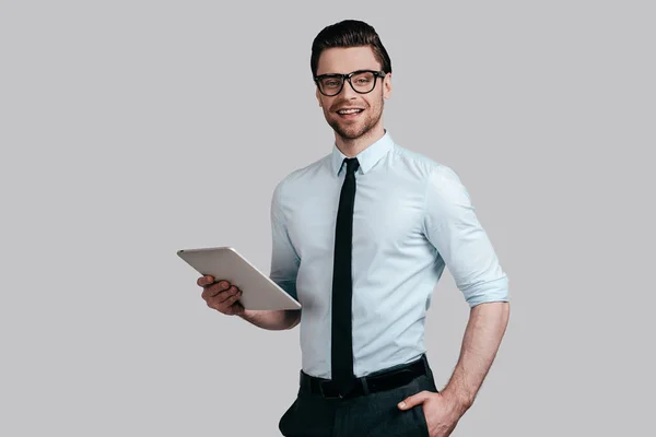 Handsome man holding digital tablet — Stock Photo, Image