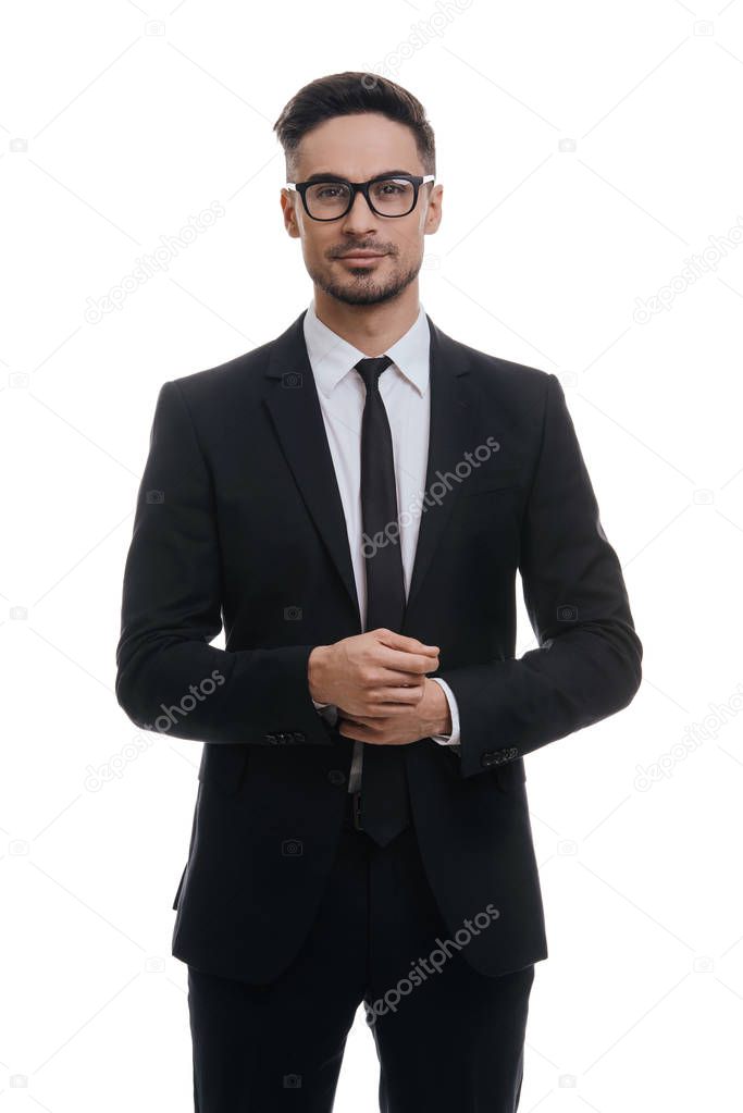 businessman adjusting sleeve