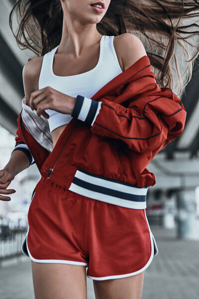 woman in sport clothing running
