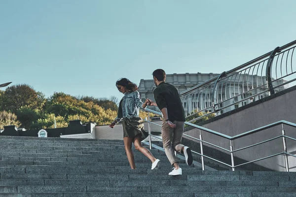 Beautiful couple holding hands — Stock Photo, Image