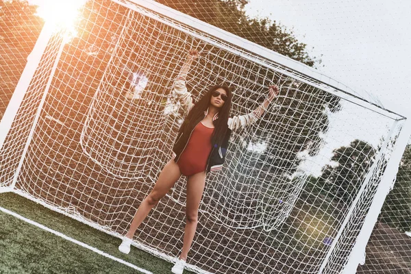 Soccer girl in red swimwear — Stock Photo, Image