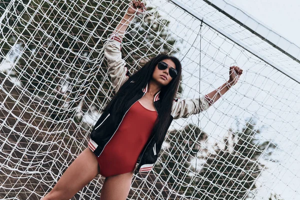 Soccer girl in red swimwear — Stock Photo, Image