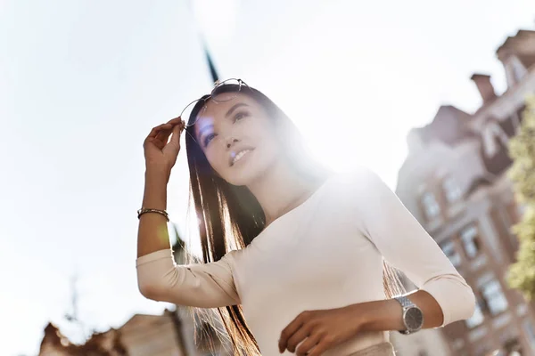 Woman adjusting glasses — Stock Photo, Image