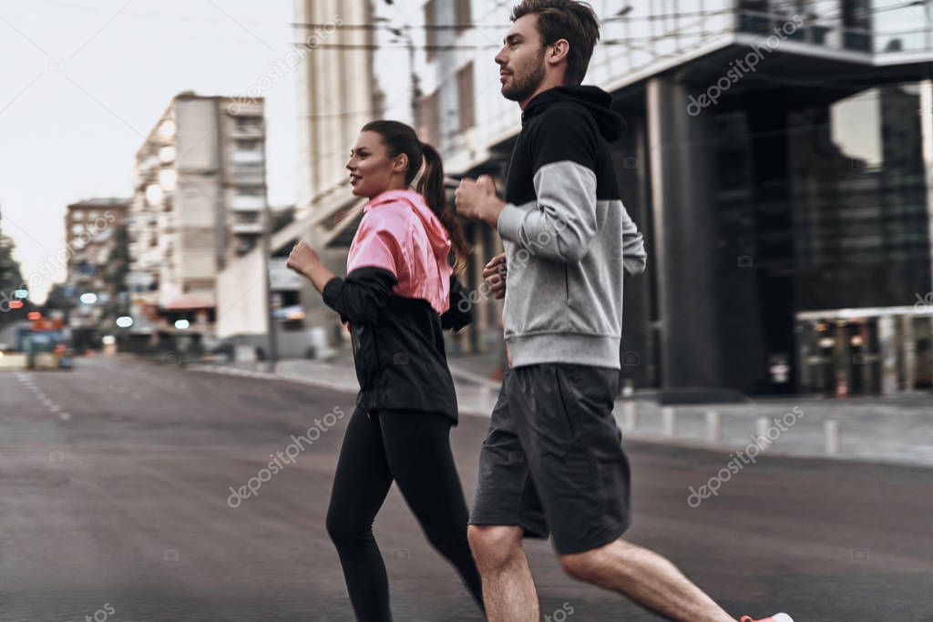 sportive couple running