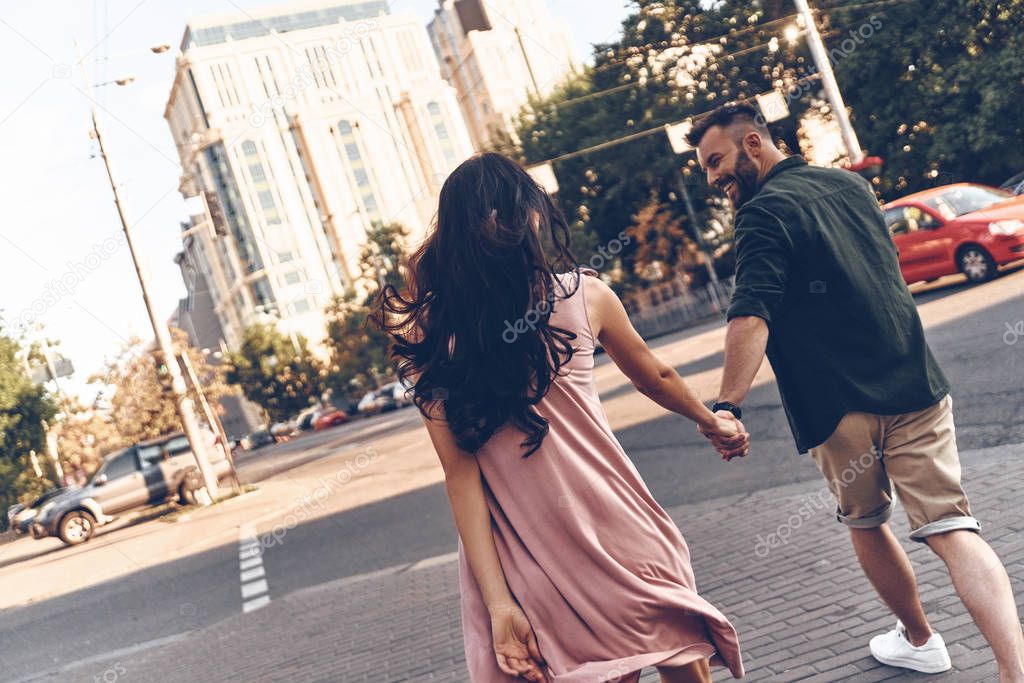 couple walking through the city street