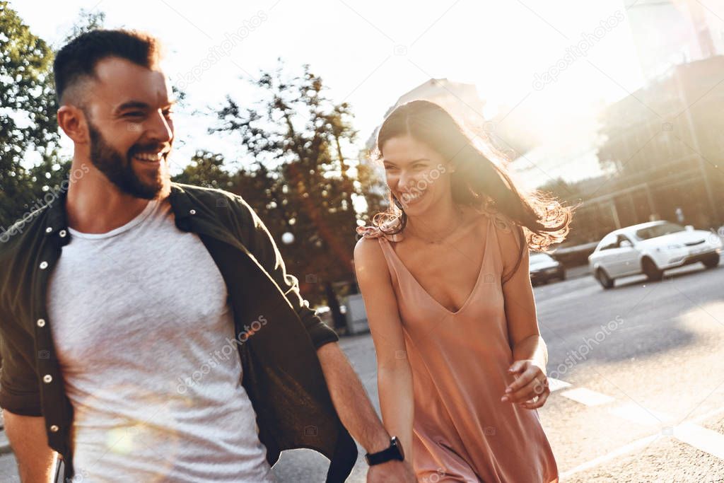 couple walking through the city street