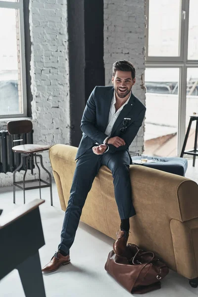 laughing handsome man in suit