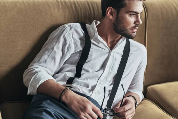 Man in formal wear and suspenders — Stock Photo, Image