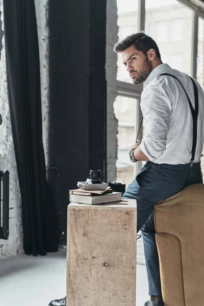 Man in white shirt and suspenders — Stock Photo, Image