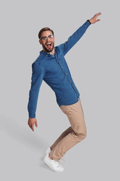 Full Length Playful Young Man Dancing Smiling Studio — Stock Photo, Image