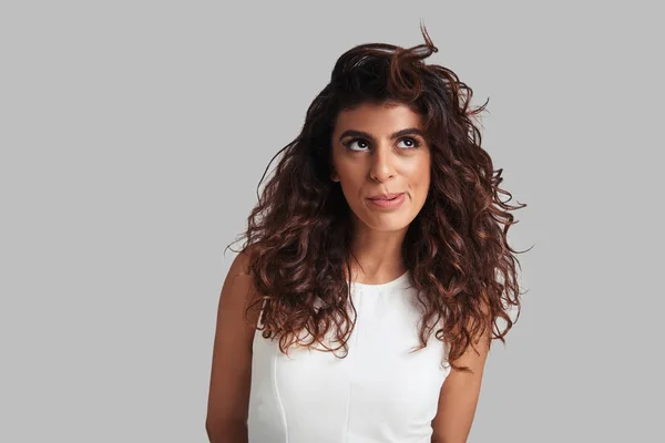 Thoughtful Woman Curly Hair Posing Studio — Stock Photo, Image