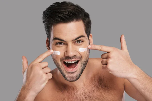 Handsome Young Man Applying Moisturizer Taking Care Face Skin — Stock Photo, Image