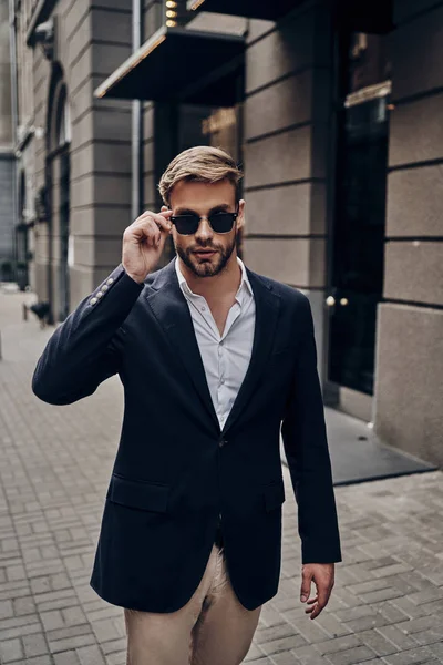 Handsome Young Man Smart Casual Wear Adjusting Eyewear While Walking — Stock Photo, Image