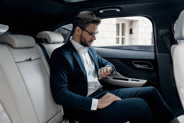 Handsome Young Businessman Suit Looking His Watch While Sitting Car — Stock Photo, Image