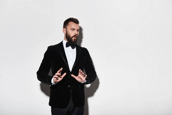 Displeased Young Man Suit Gesturing Hands Looking Camera While Standing — Stock Photo, Image