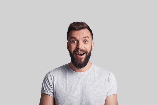 Good News Shocked Young Man Looking Camera Smiling While Standing — Stock Photo, Image