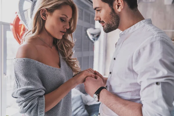 Romantic Young Couple Holding Hands While Standing Home — Stock Photo, Image