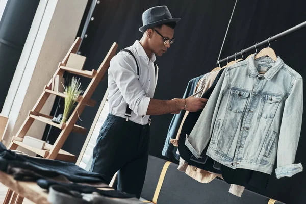 Handsome Stylish Young Man Choosing Clothes Showroom — Stock Photo, Image