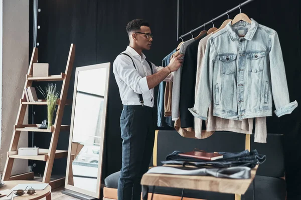 Stylish Young Man Choosing Clothes Showroom — Stock Photo, Image