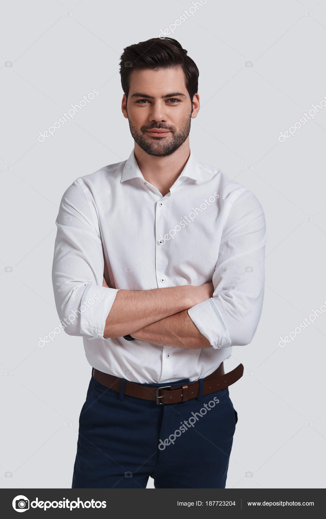 Man Looking Camera Smile Keeping Arms Crossed While Standing Grey Stock ...
