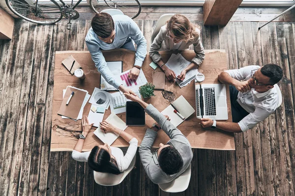 Top View Young Partners Shaking Hands Table Office — Stock Photo, Image