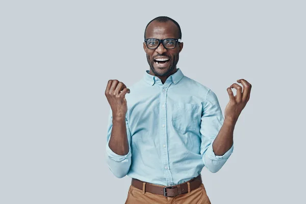 Playful Young African Man Looking Camera Making Face While Standing — Stock Photo, Image