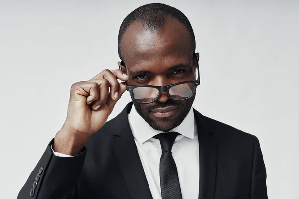 Confident Young African Man Formal Wear Looking Camera Adjusting Eyewear — Stock Photo, Image