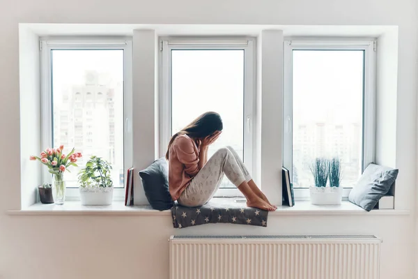 Sad Young Woman Crying Something While Sitting Window Sill Home — Stock Photo, Image