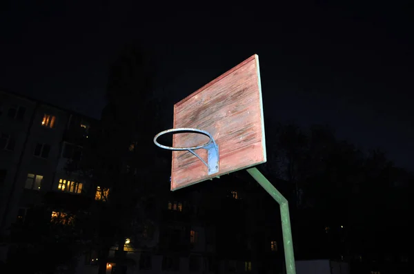 ball ring in the game of basketball in the yard of the house