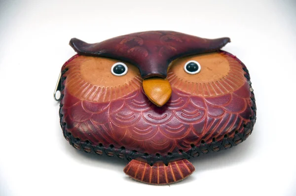 Kuş derisi şeklinde bozuk para çantası. Güzel.