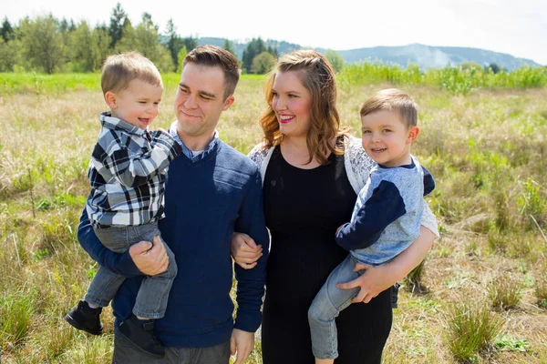 Family Portrait of Four Outdoors — Stock Photo, Image