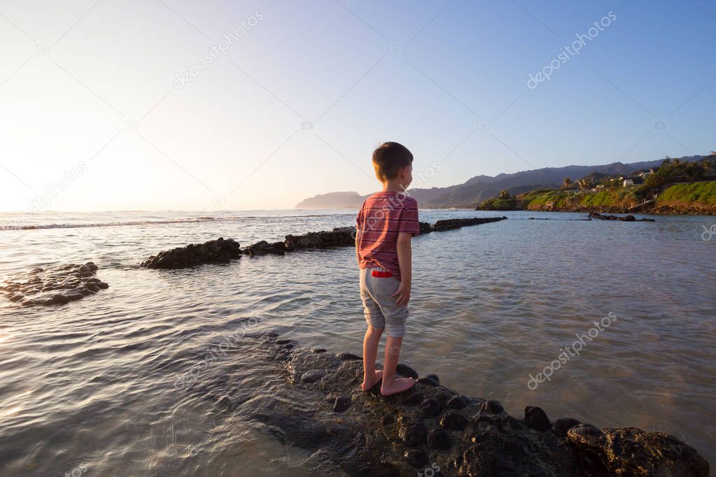 Child Playing on Beach in Oahu Hawaii