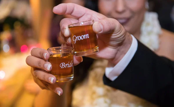 Bride and Groom Shot Glasses with Whiskey — Stock Photo, Image