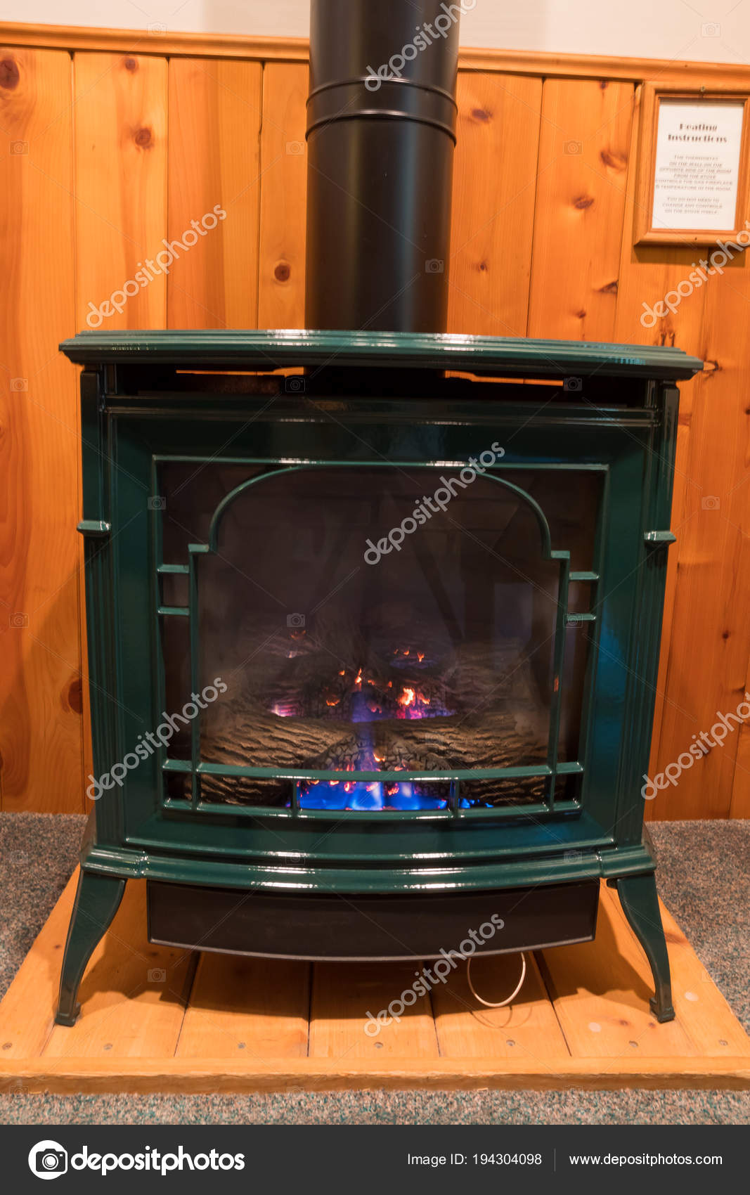 Propane Stove Fireplace In Bedroom Stock Photo